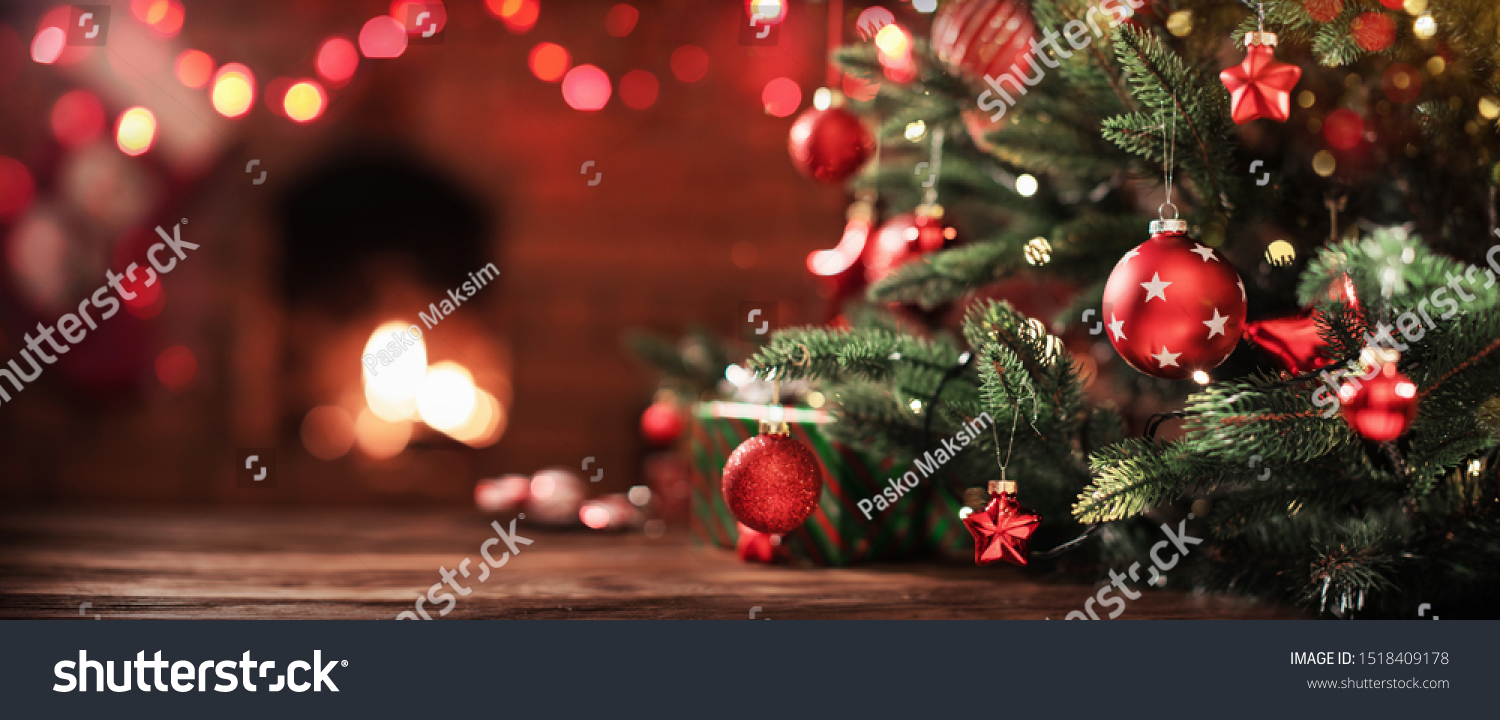 Christmas Tree with Decorations Near a Fireplace with Lights #1518409178