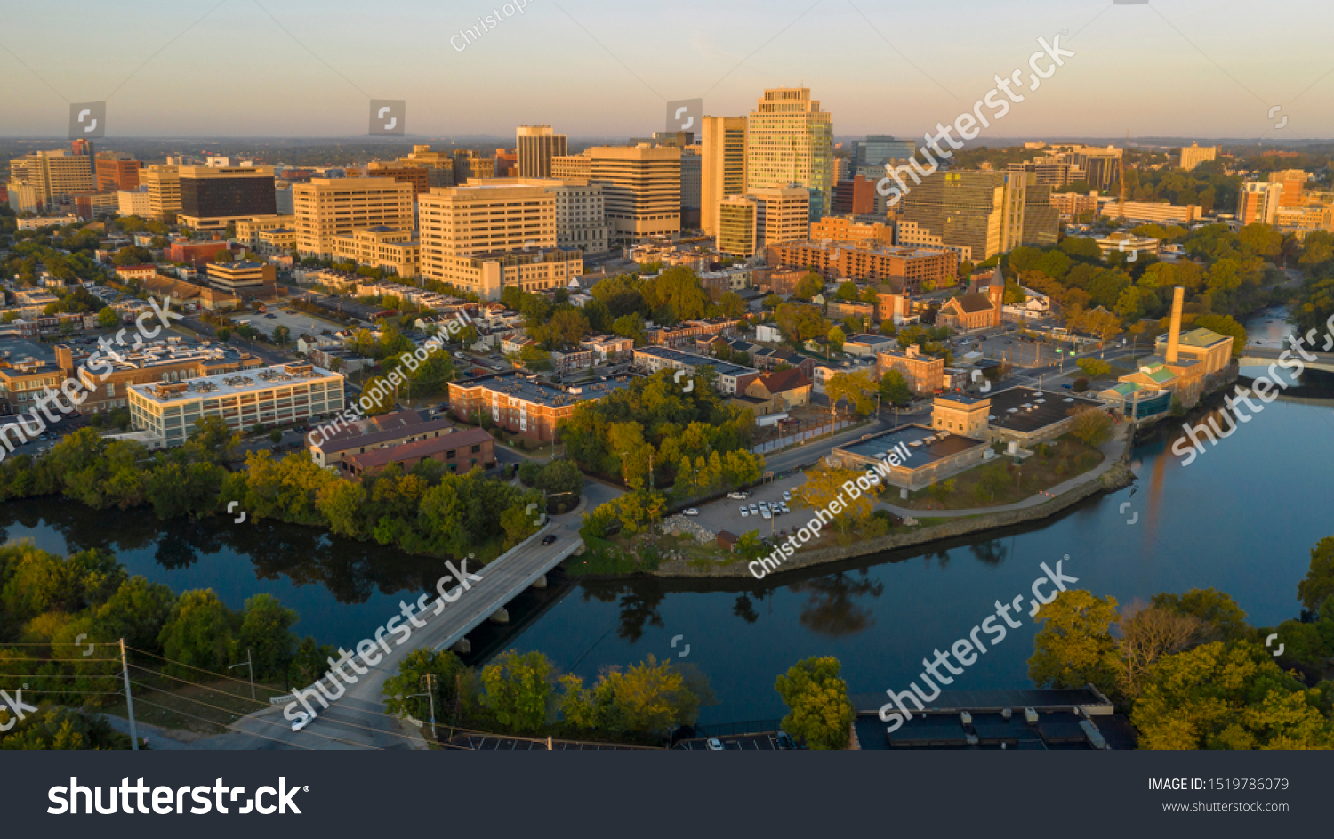 Saturated early morning light hits the buildings and architecture of downtown Wilmington Delaware #1519786079