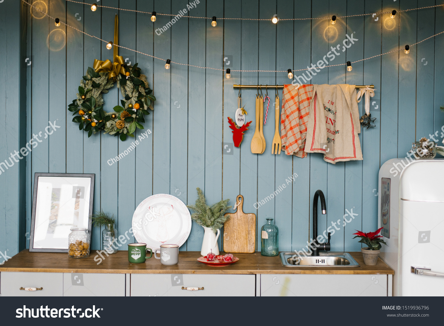 Kitchen, decorated for Christmas and New Year in white and blue shades of Scandinavian style #1519936796