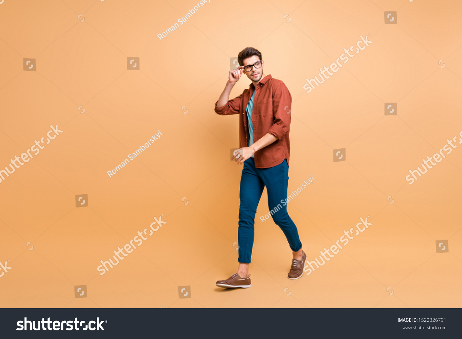 Full length body size profile side view of his he nice attractive trendy calm brunette guy business assistant shark expert touching specs walking isolated over beige color pastel background #1522326791