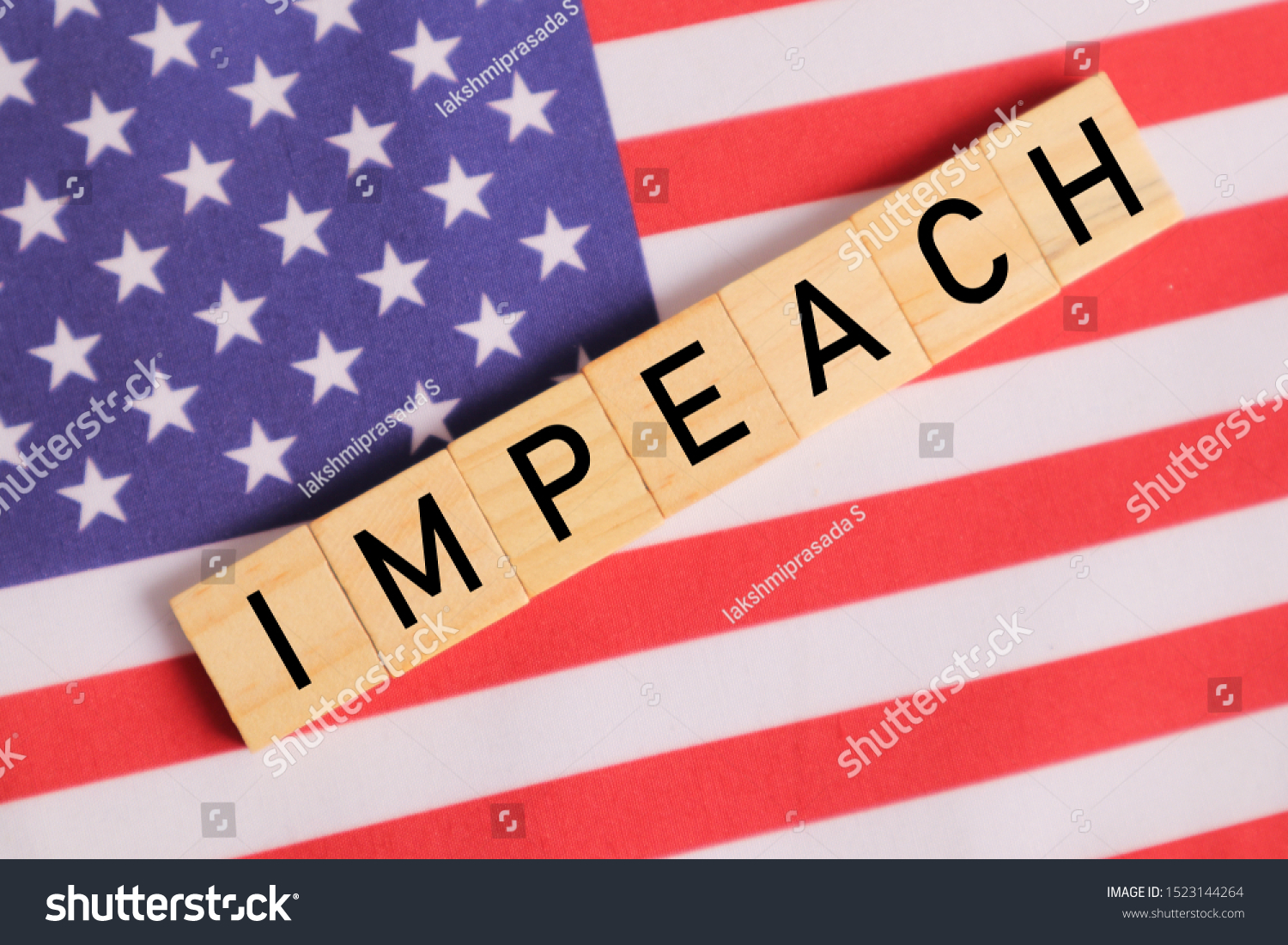 Concept of US politics, Impeachment showing with US flag with Impeach in wooden letters. #1523144264
