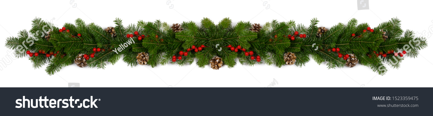 Christmas Border frame of tree branches red berries and pine cones on white background with copy space isolated #1523359475