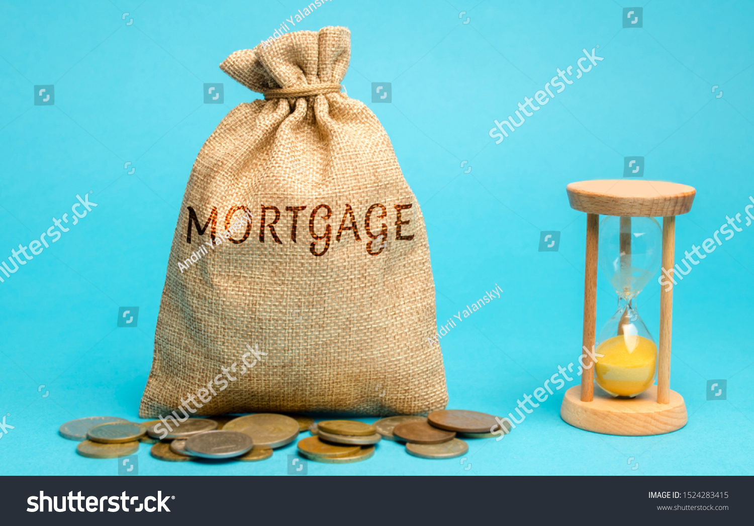 Money bag with the word Mortgage and hourglass. Mortgage rates concept. Loan and credit. Interest payment. Business and finance. Real estate, housing #1524283415
