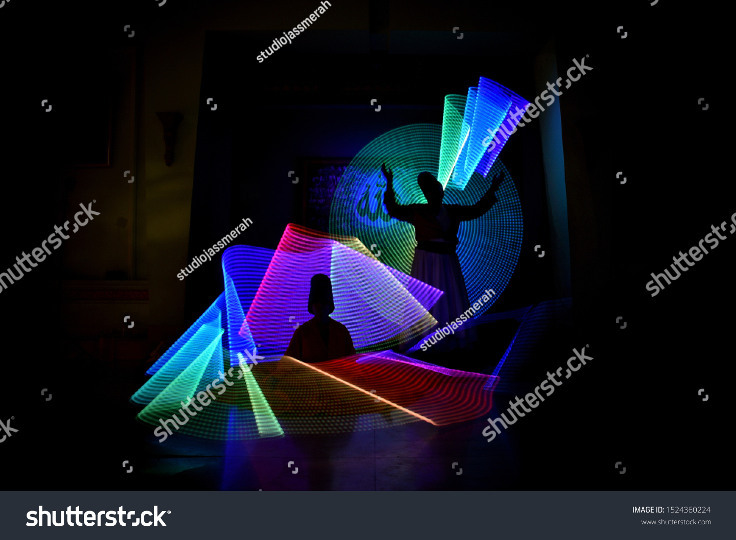 whirling Sufi dance in silhouette #1524360224