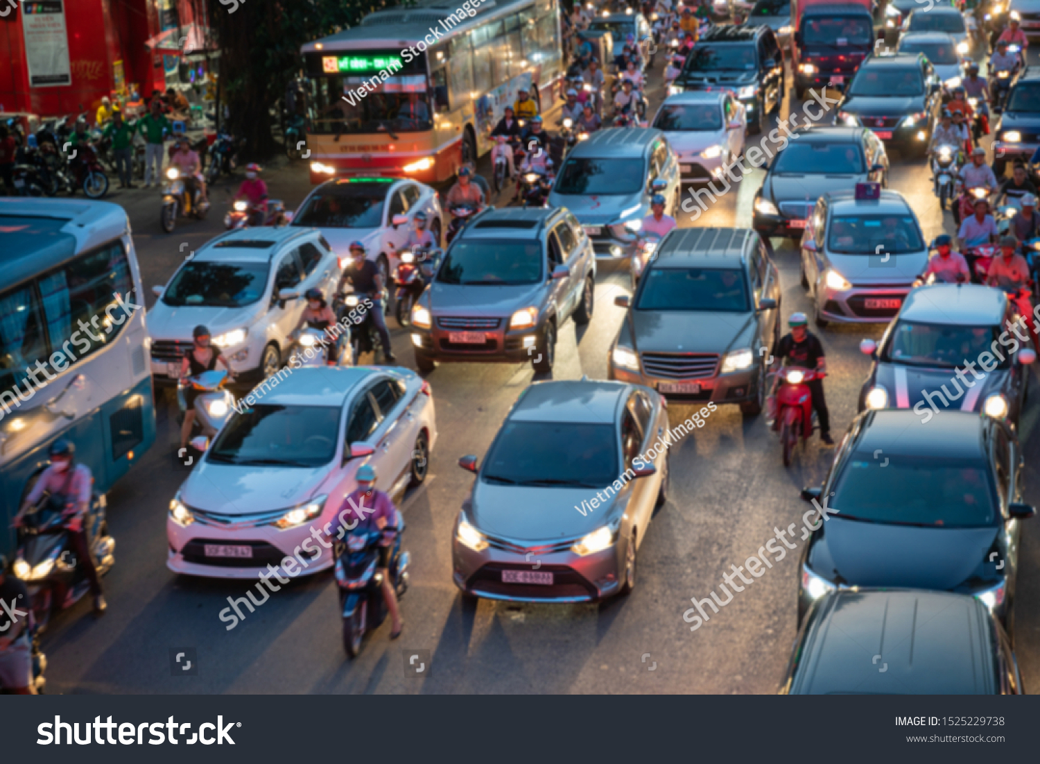 Blurred car traffic background at rush hour in Hanoi street, Vietnam #1525229738