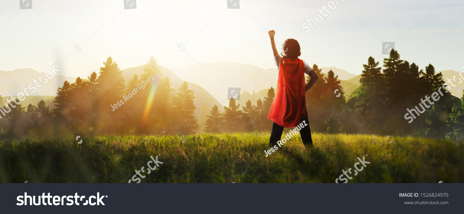 child dreaming of super hero in the mountain #1526824970
