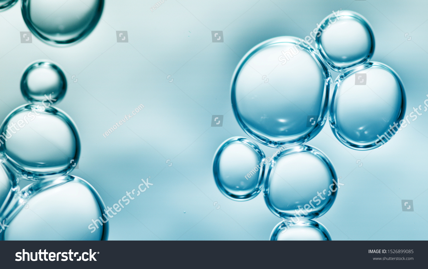 transparent gas bubbles on water surface. Worms-eye low angle with crystal bubbles in purified water on blue background. cosmetic background with copy space #1526899085