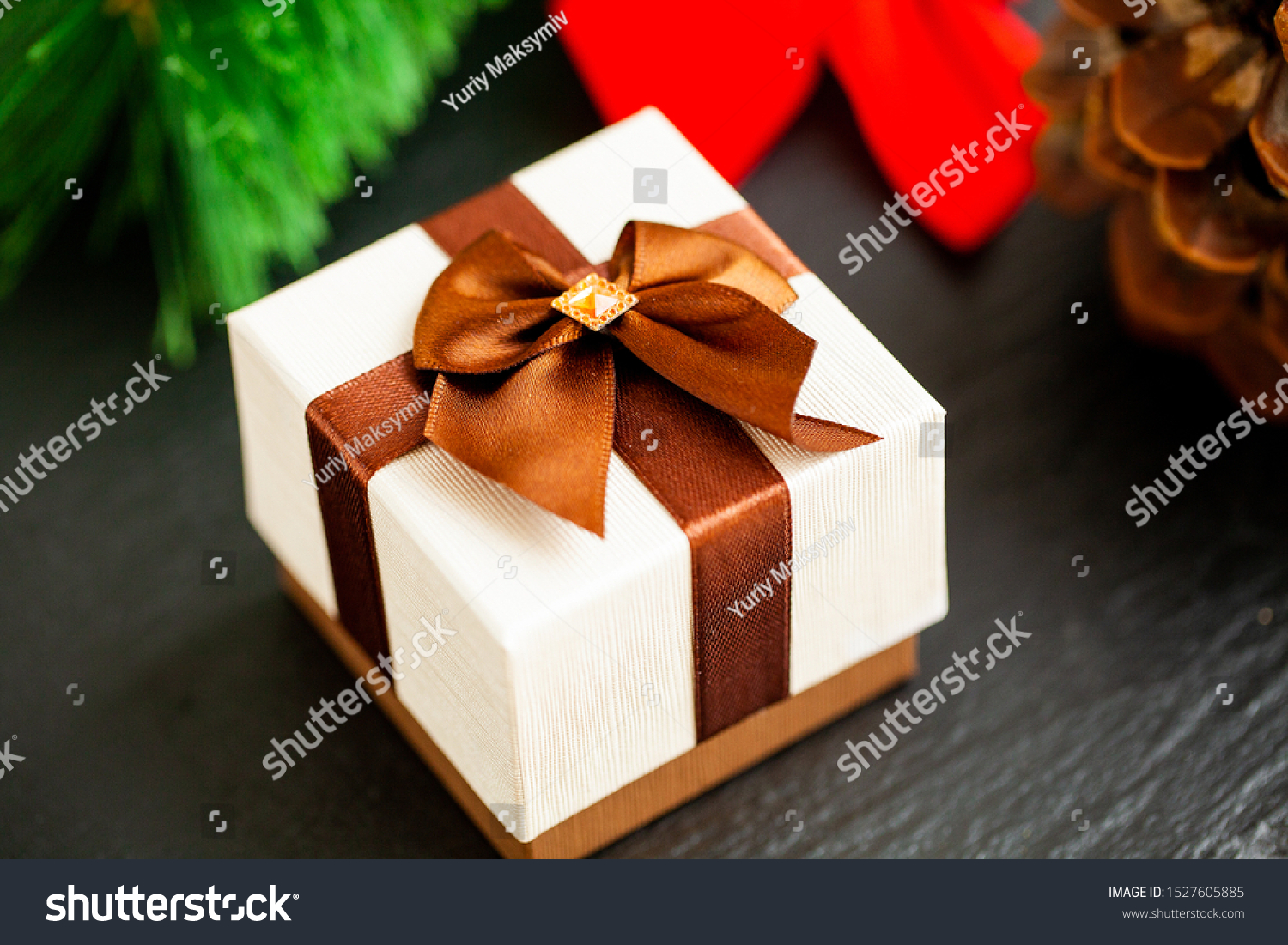 New year gift with christmas decorations on dark background #1527605885
