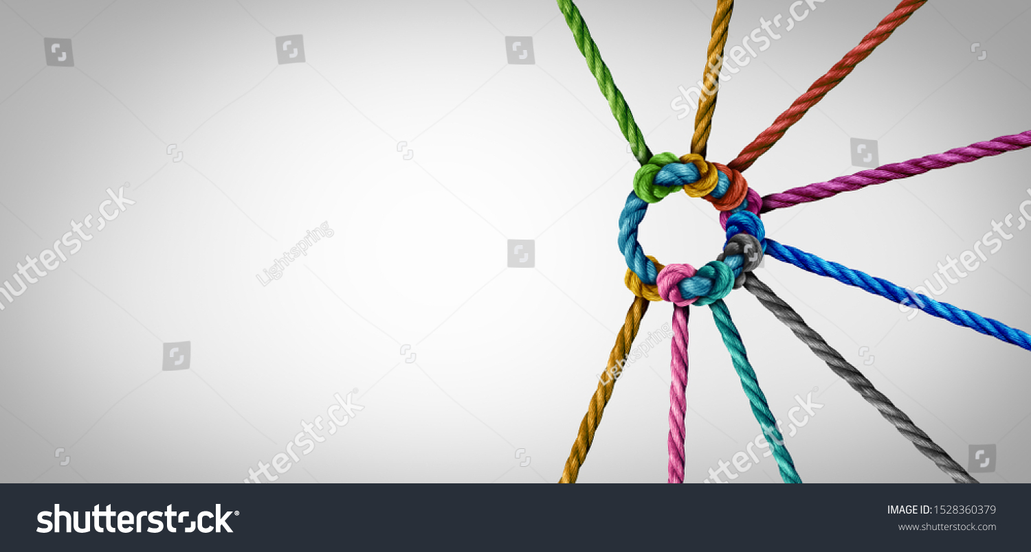 Unity and teamwork concept as a business metaphor for joining a partnership as diverse ropes connected together as a corporate symbol for cooperation and working collaboration. #1528360379