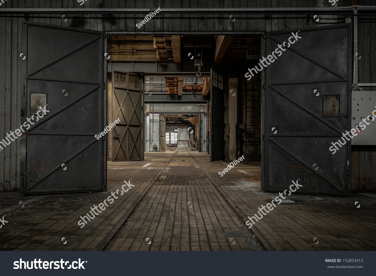 Large industrial door in a factory #152853413