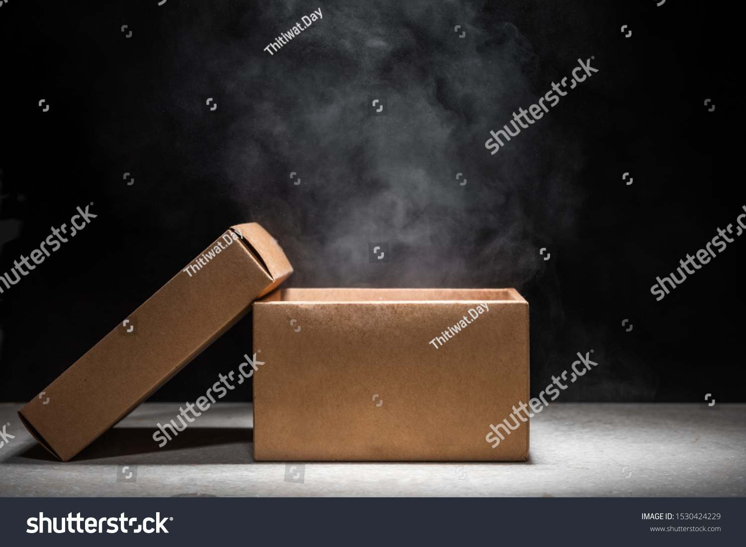 opened mystery box with smoke float up on dark background #1530424229