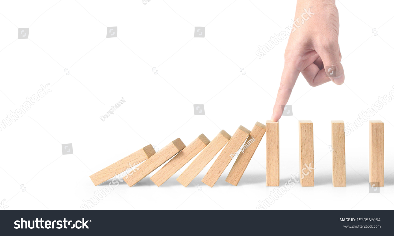 Hand stopping the Domino effect stopped by unique, Business Ideas #1530566084