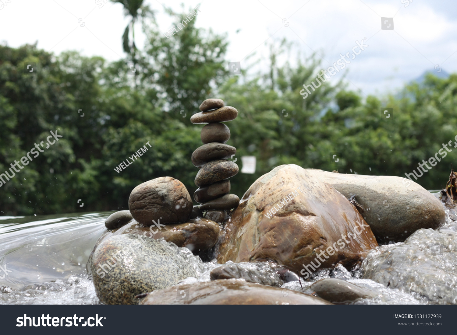 STONE BALANCING
stone balancing is an art, discipline, or hobby in which rocks are naturally balanced on top of one another in various positions without the use of adhesives, wires, supports, #1531127939