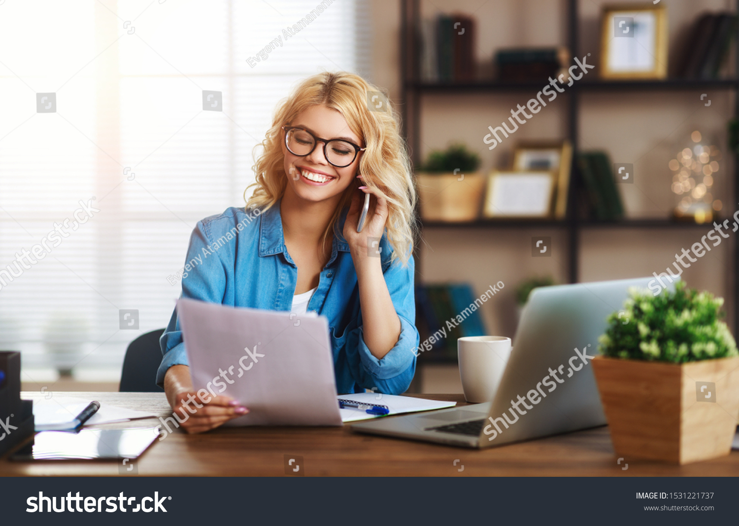 happy young cheerful business woman at home office working on computer
 #1531221737