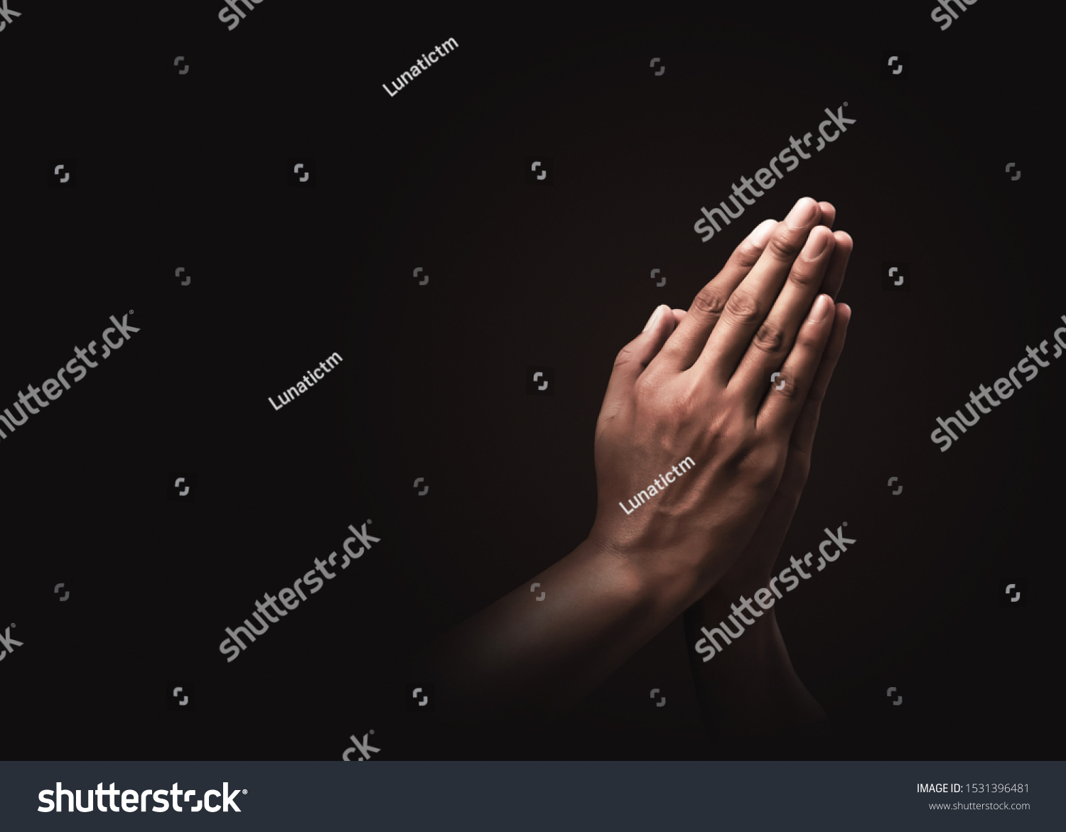Praying hands with faith in religion and belief in God on dark background. Power of hope or love and devotion. Namaste or Namaskar hands gesture. Prayer position.