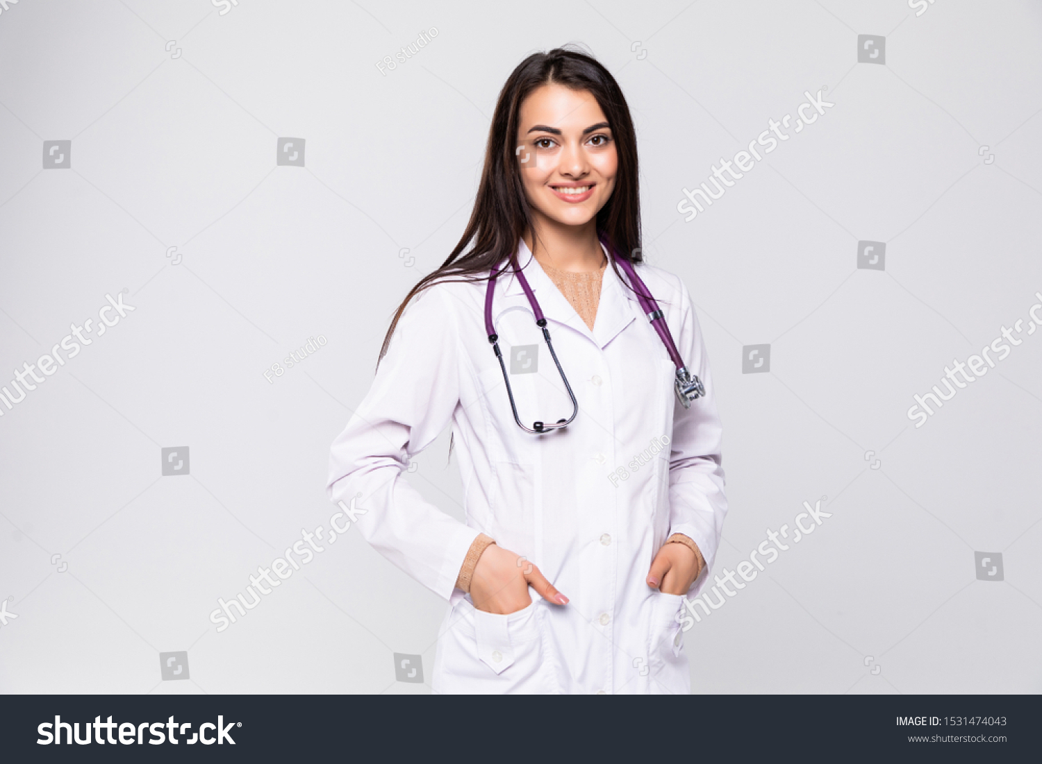 Beautiful young doctor with stethoscope #1531474043