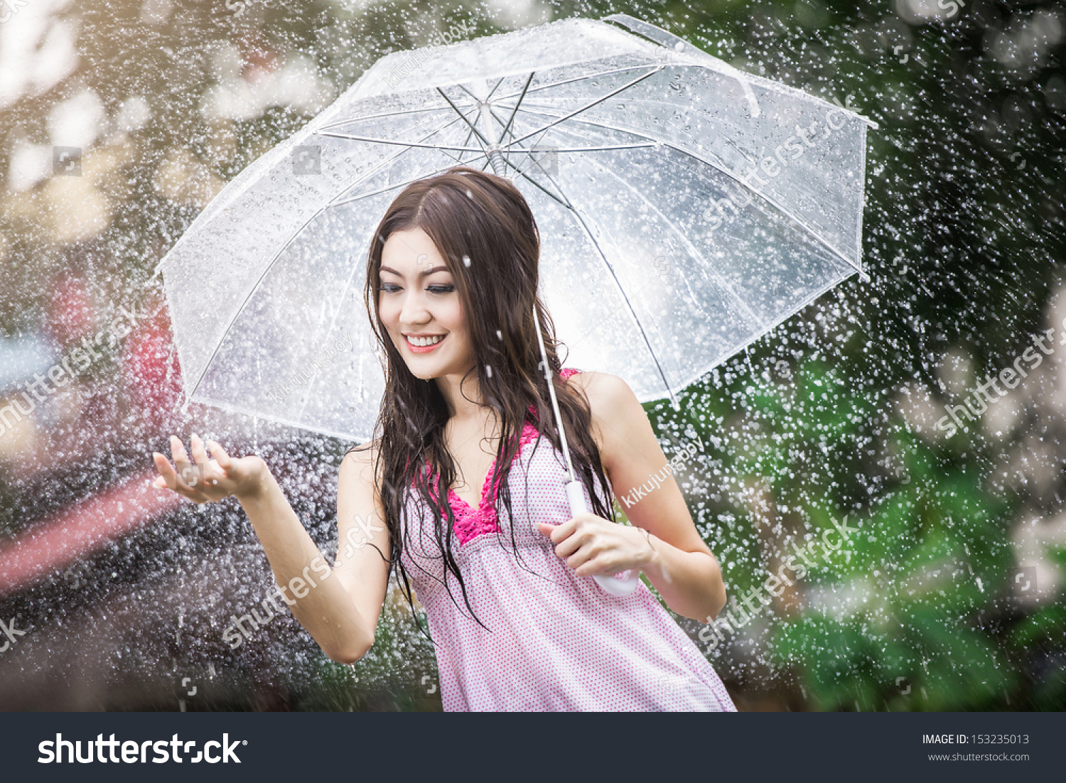 Beautiful Girl In The Rain With Stock Photo 153235013