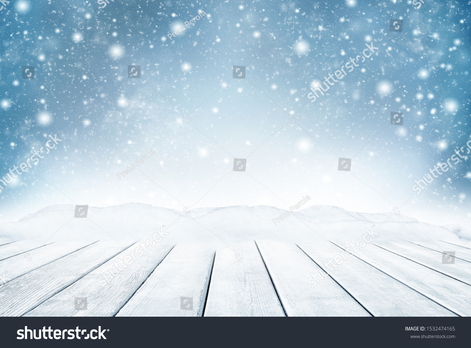 Decorative Christmas background with bokeh lights, snowflakes and empty old wooden table. Christmas and Happy New Year blue background with snowflake. Winter landscape with falling snow. #1532474165