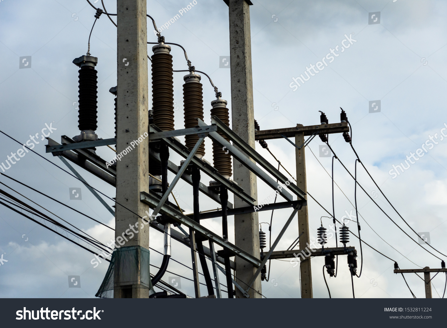 High voltage cables with electrical insulator and electrical equipment in power substation. #1532811224