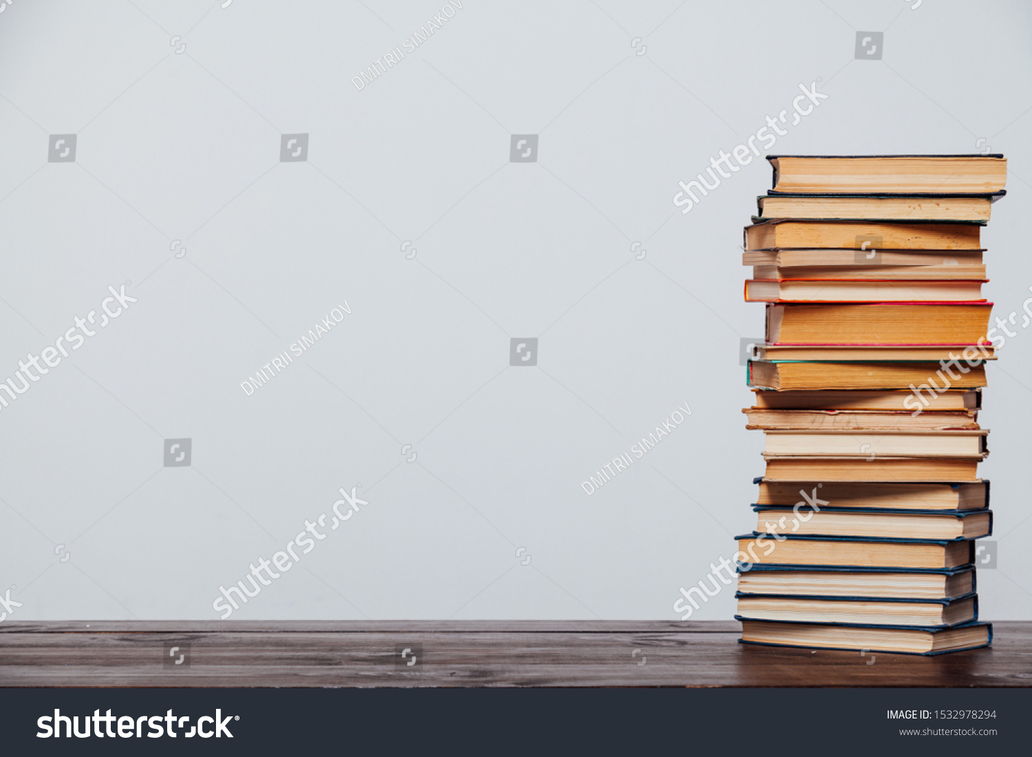stacks of educational books university library background #1532978294