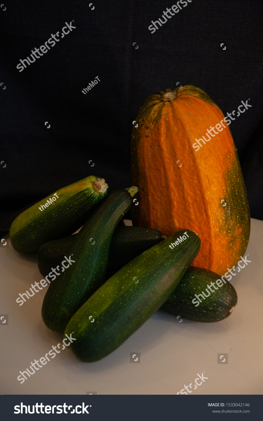 Vegetables: zucchini, pumpkin, still life. #1533042146