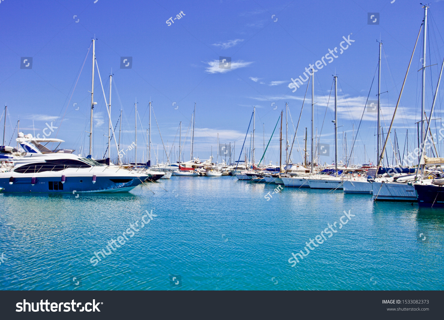 yachts and speed boats at harbor. yachts moored in the port. Ocean Coast pier. High class lifestyle. Yachting. Expensive toys. Sea ​​transport. Journey. Yachting sport. Expensive yachts at the pier #1533082373