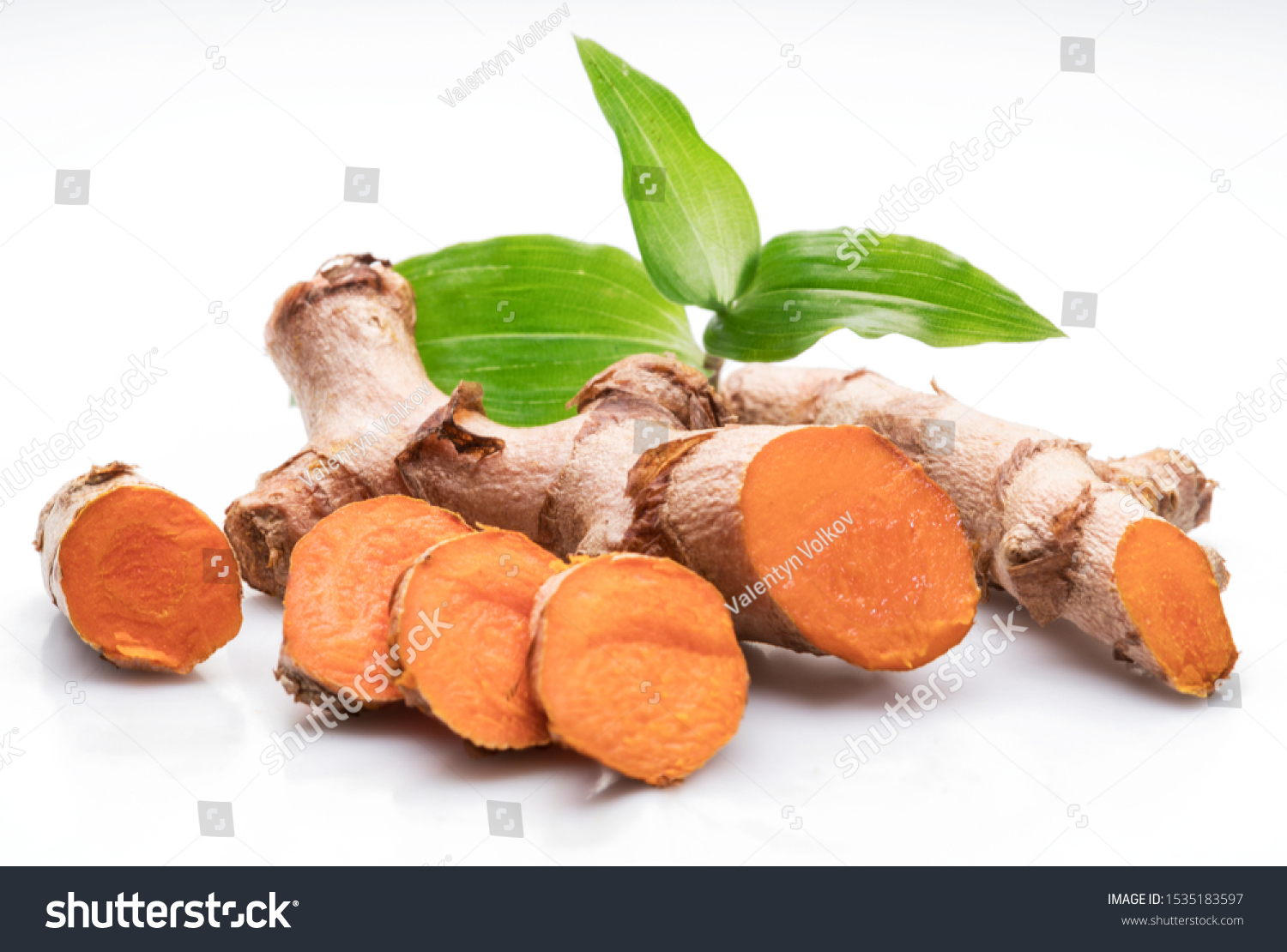 Fresh turmeric rhizome and turmeric cuts isolated on white background. #1535183597