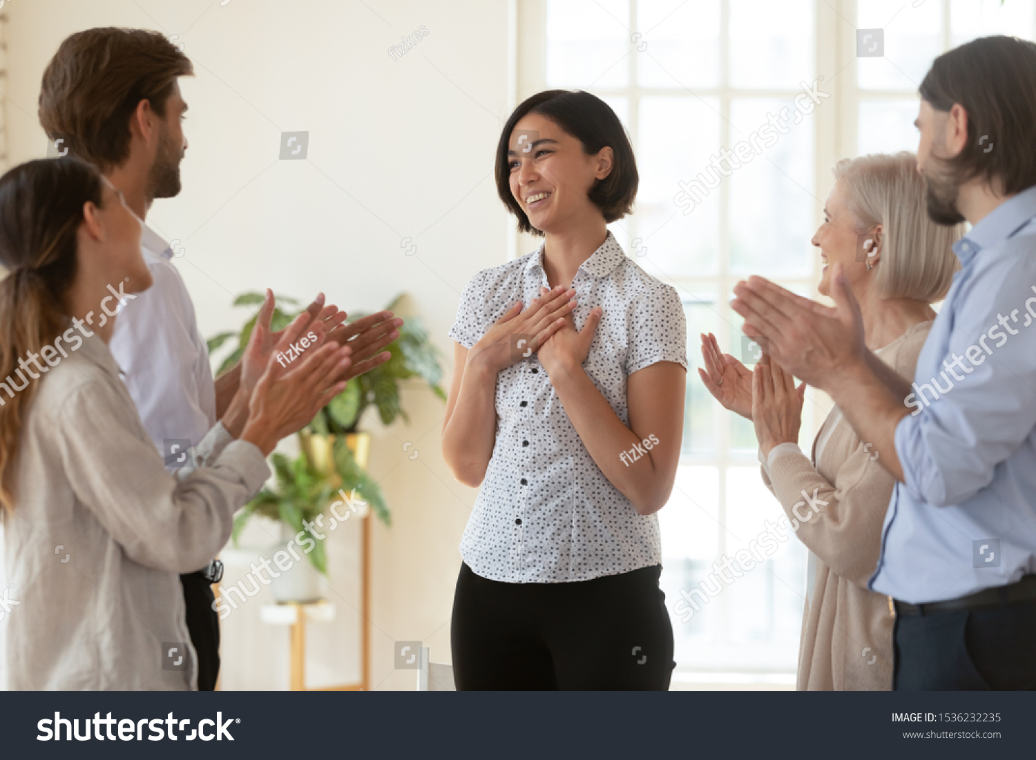 Pleased proud asian young businesswoman get multiethnic team appreciation support applause, happy diverse business people group applauding praising korean female worker, employee recognition concept #1536232235