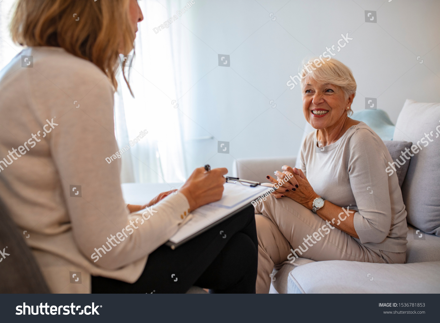 Geriatric psychology, mental therapy and old age concept - Senior woman patient and psychologist at psychotherapy session. Senior woman talking with female psychologist #1536781853