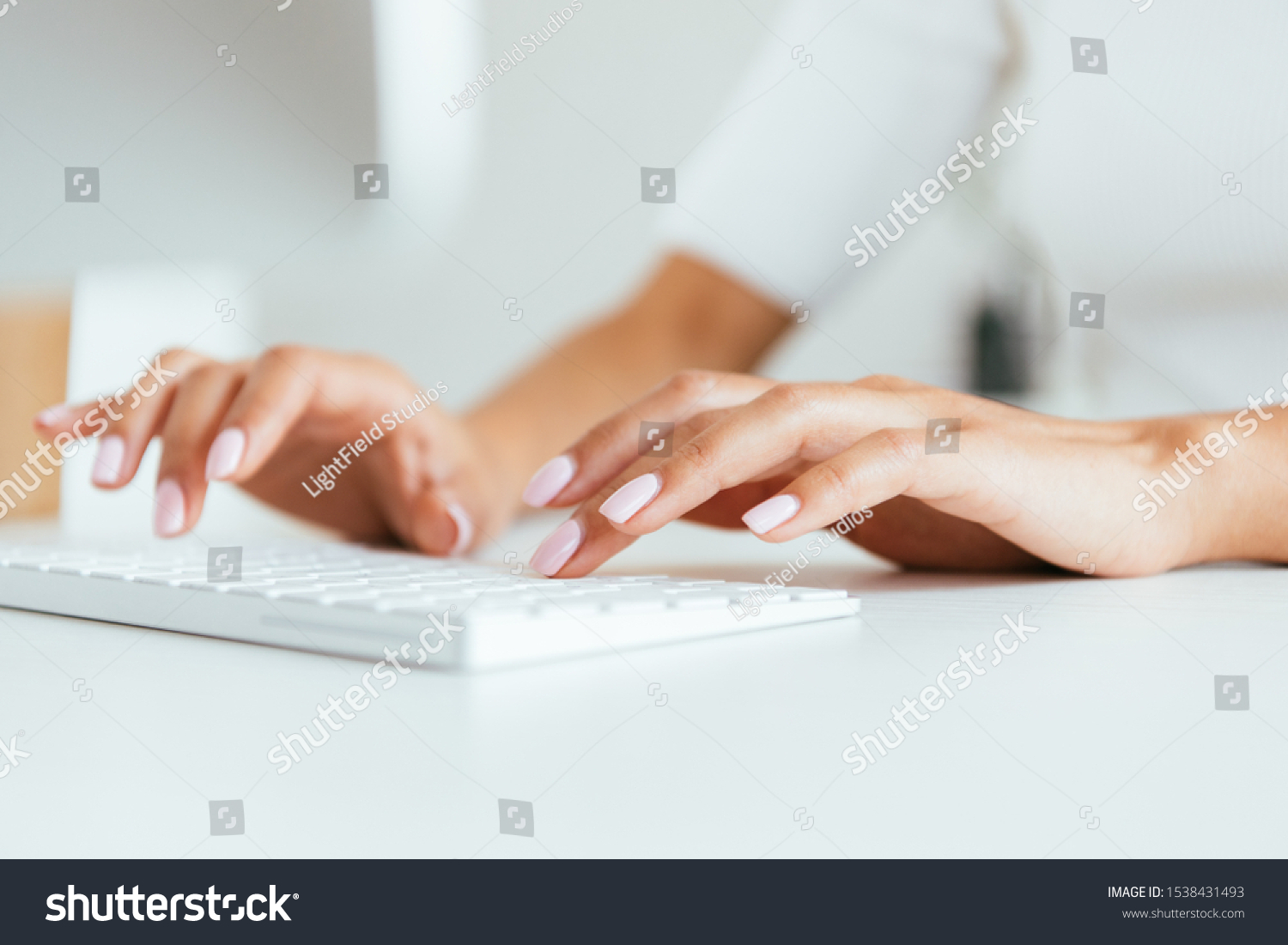 cropped view of broker typing on computer keyboard in office  #1538431493