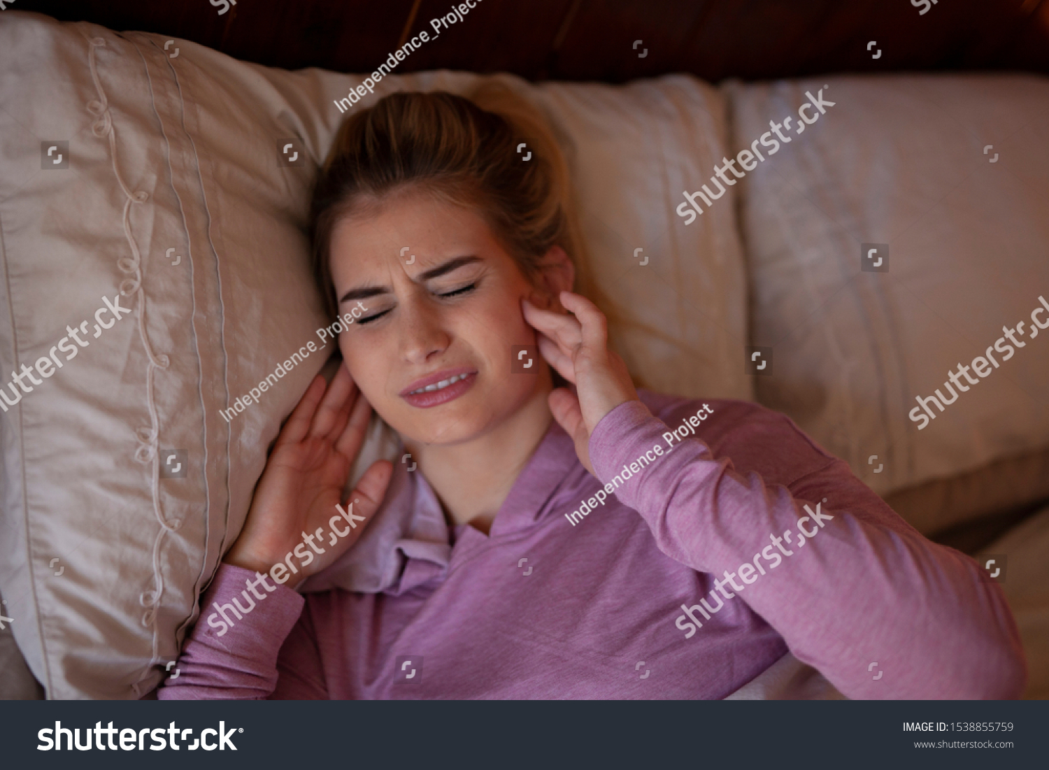 Jaw pain after sleeping, bruxisum TMJ teeth Royalty Free Stock Photo