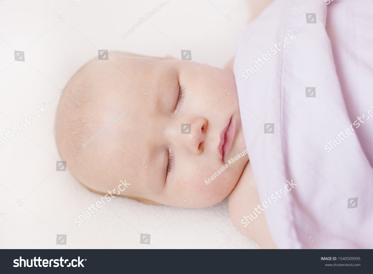 Sleeping peaceful innocent tender baby infant under the blanket #1540509995