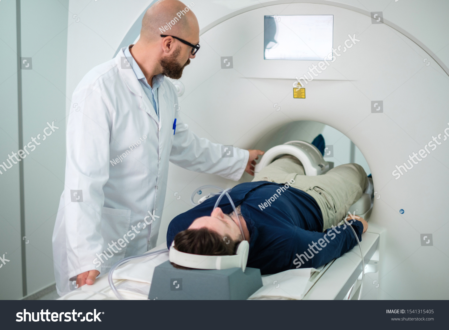 Patient visiting MRI procedure in a hospital #1541315405