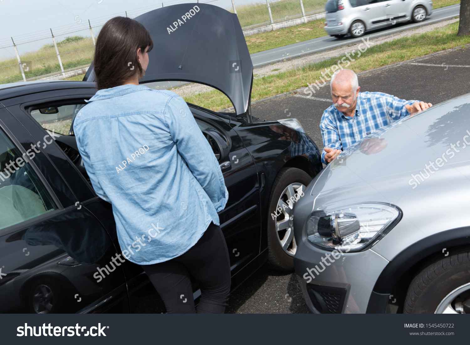 two drivers arguing after traffic accident #1545450722