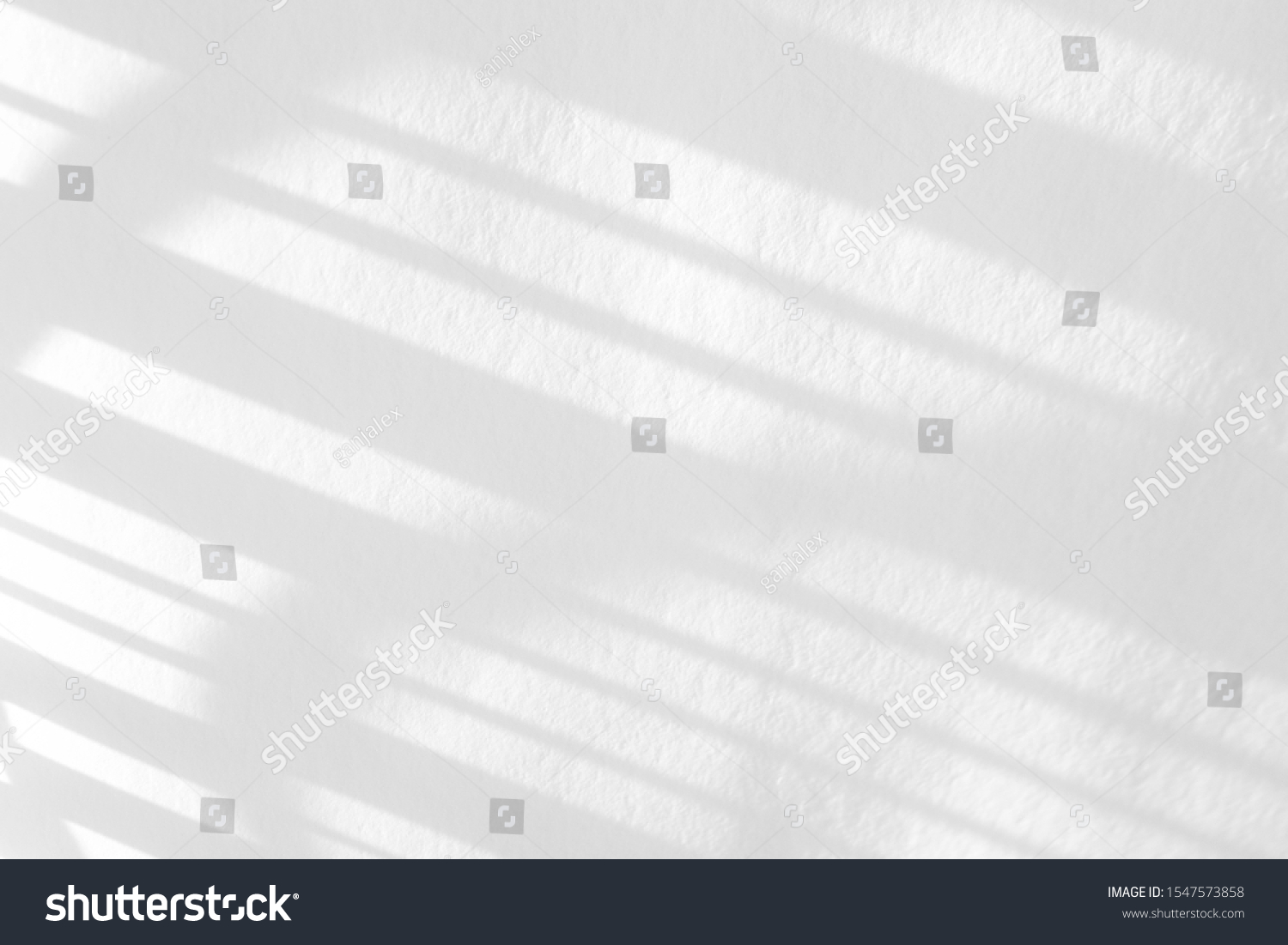 Overlay effect for photo and design. Organic drop diagonal shadow on a white wall.  #1547573858