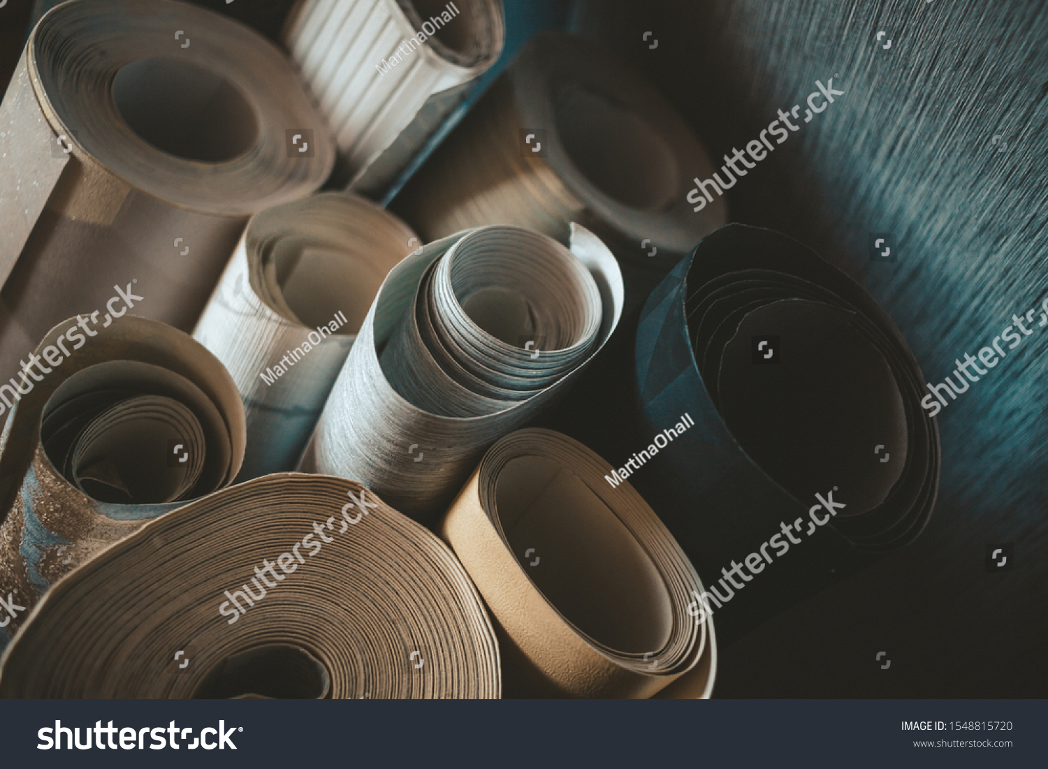 Different wallpaper rolls. Various textures and colours. #1548815720