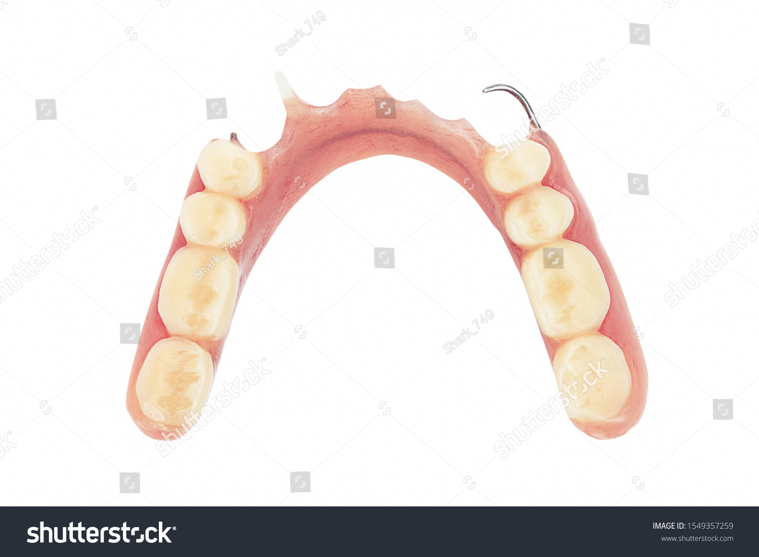 Old dentures isolated on white background with clipping path #1549357259