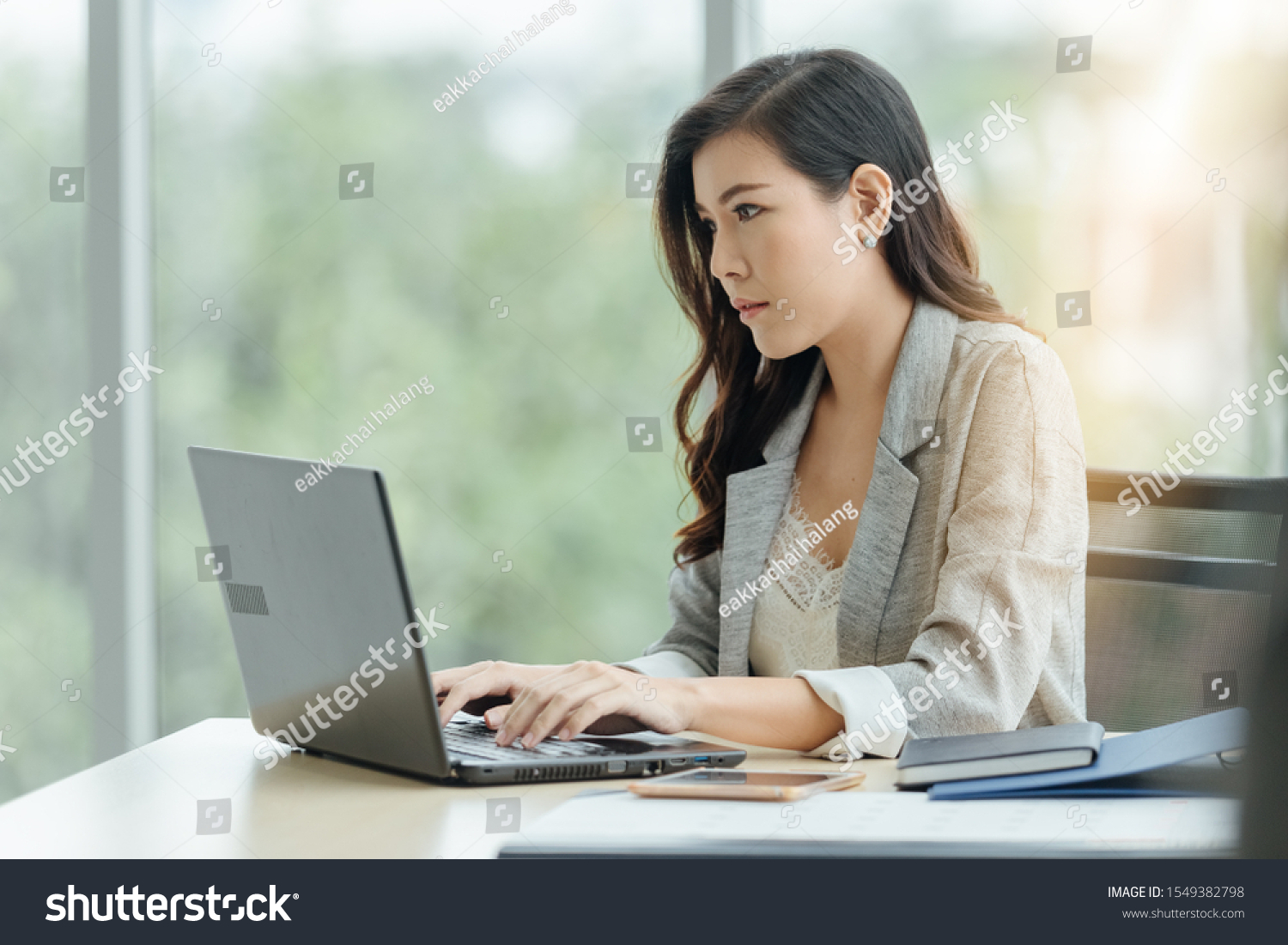 asian attractive mature businesswoman working on - Royalty Free Stock ...