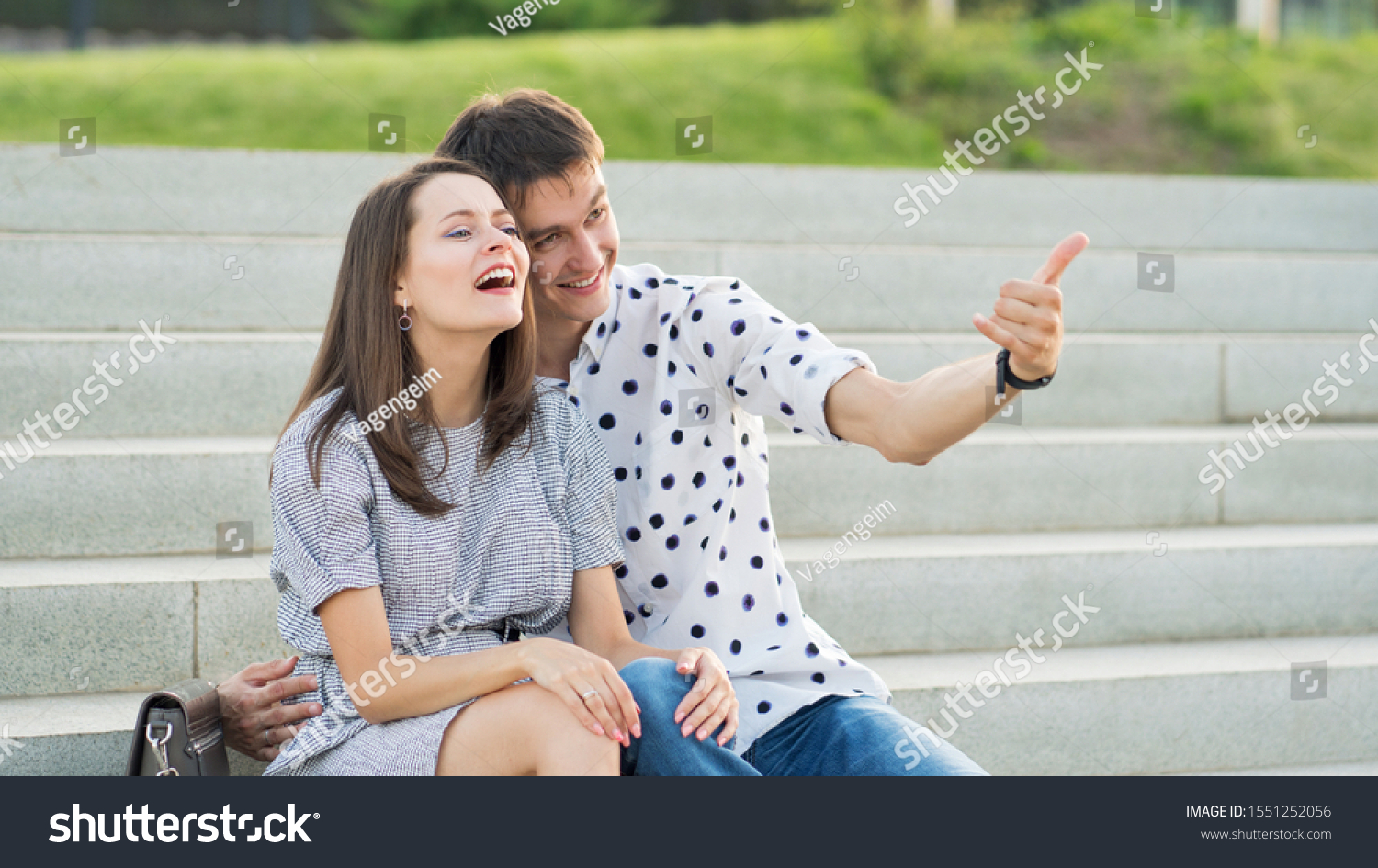 Couple lover enjoy honeymoon and long vacation, together relax and confortable, valentine occasion. Girl and guy spend time together in park. Lovers enjoying to each other and joint pranks. #1551252056
