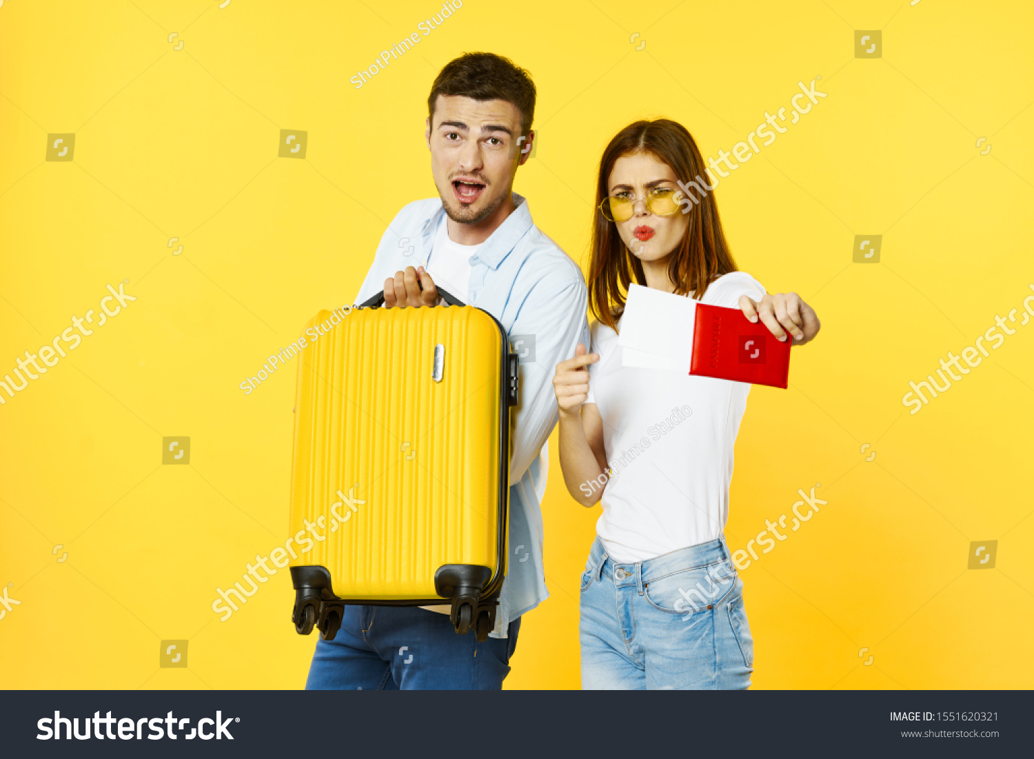 Cheerful man and woman suitcase passport and airplane ticket #1551620321