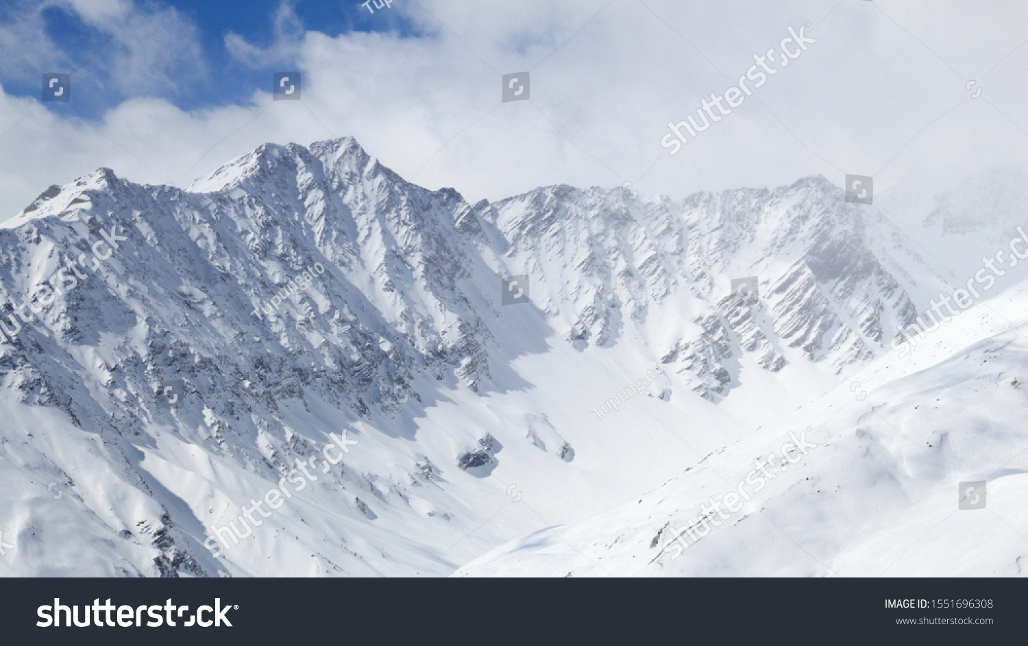 Winter Alps - Massif des Cerces mountain range in Rhone-Alpes region of France. European snow. #1551696308
