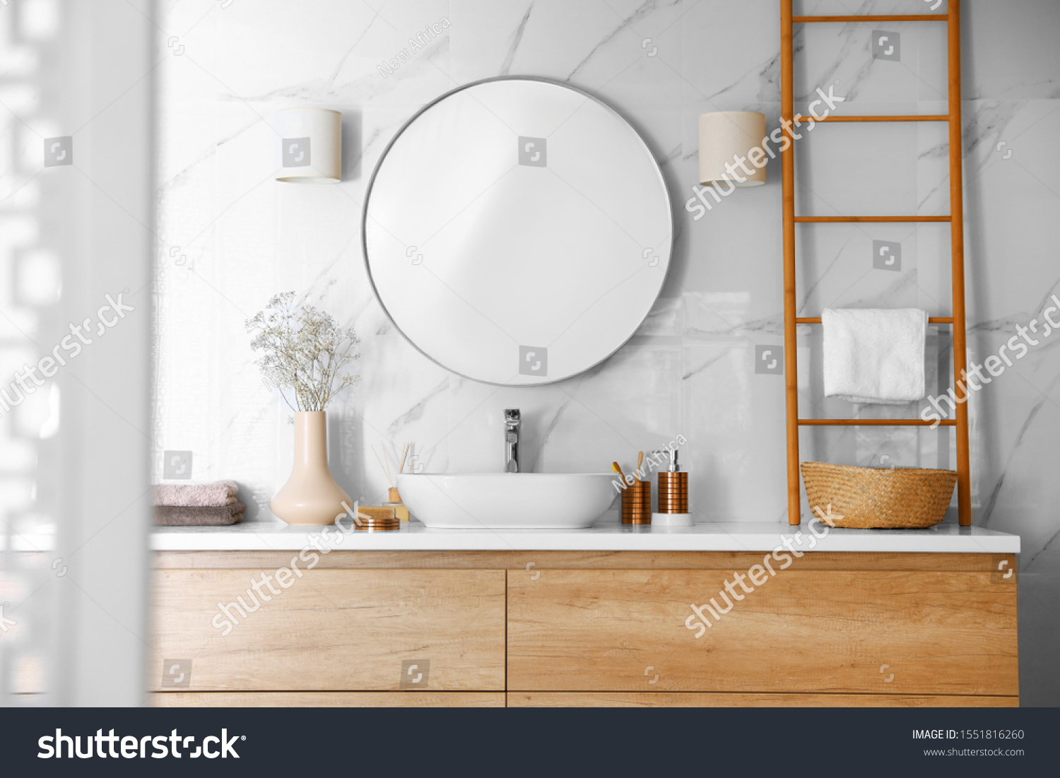Modern bathroom interior with stylish mirror and vessel sink #1551816260