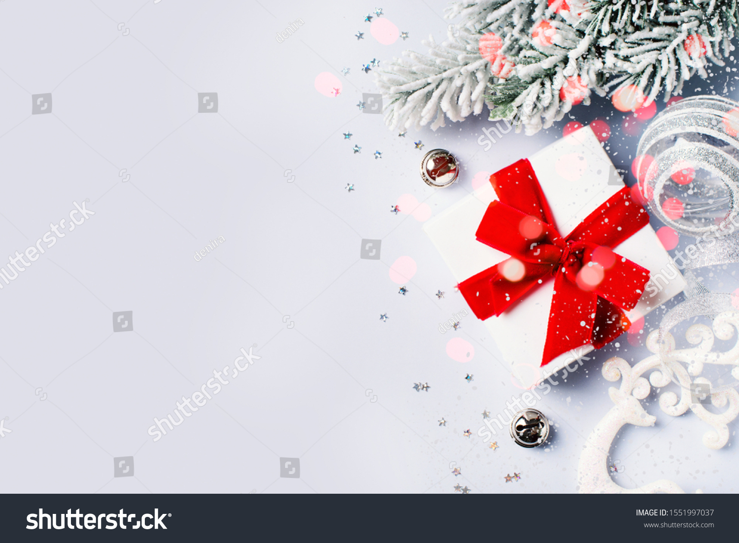 Christmas gift box flat lay on white background with decoration. Happy new year background and backdrop, copy space, top view #1551997037