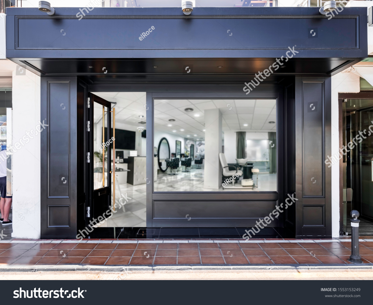 Outdoor mockup,store template,front view black of generic store facade with windows display and blanck posters. #1553153249