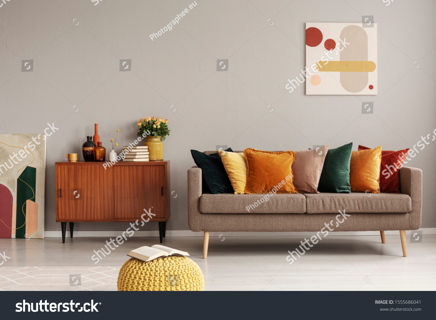 Retro style in beautiful living room interior with grey empty wall #1555686041