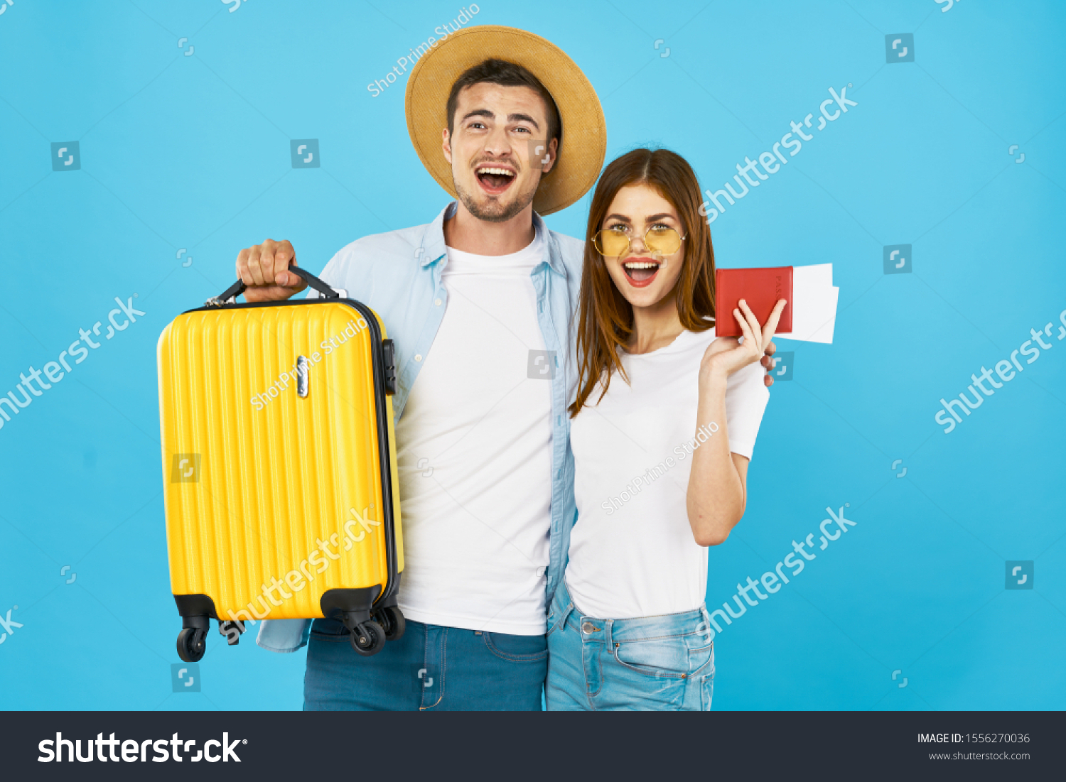 Passport tickets woman and man yellow suitcase #1556270036