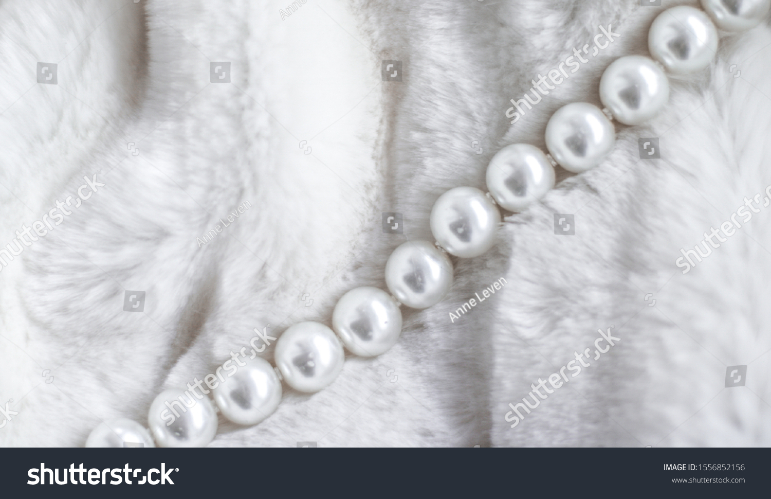 Jewelry branding, elegance and sale concept - Winter holiday jewellery fashion, pearl necklace on fur background, glamour style present and chic gift for luxury jewelery brand shopping, banner design #1556852156