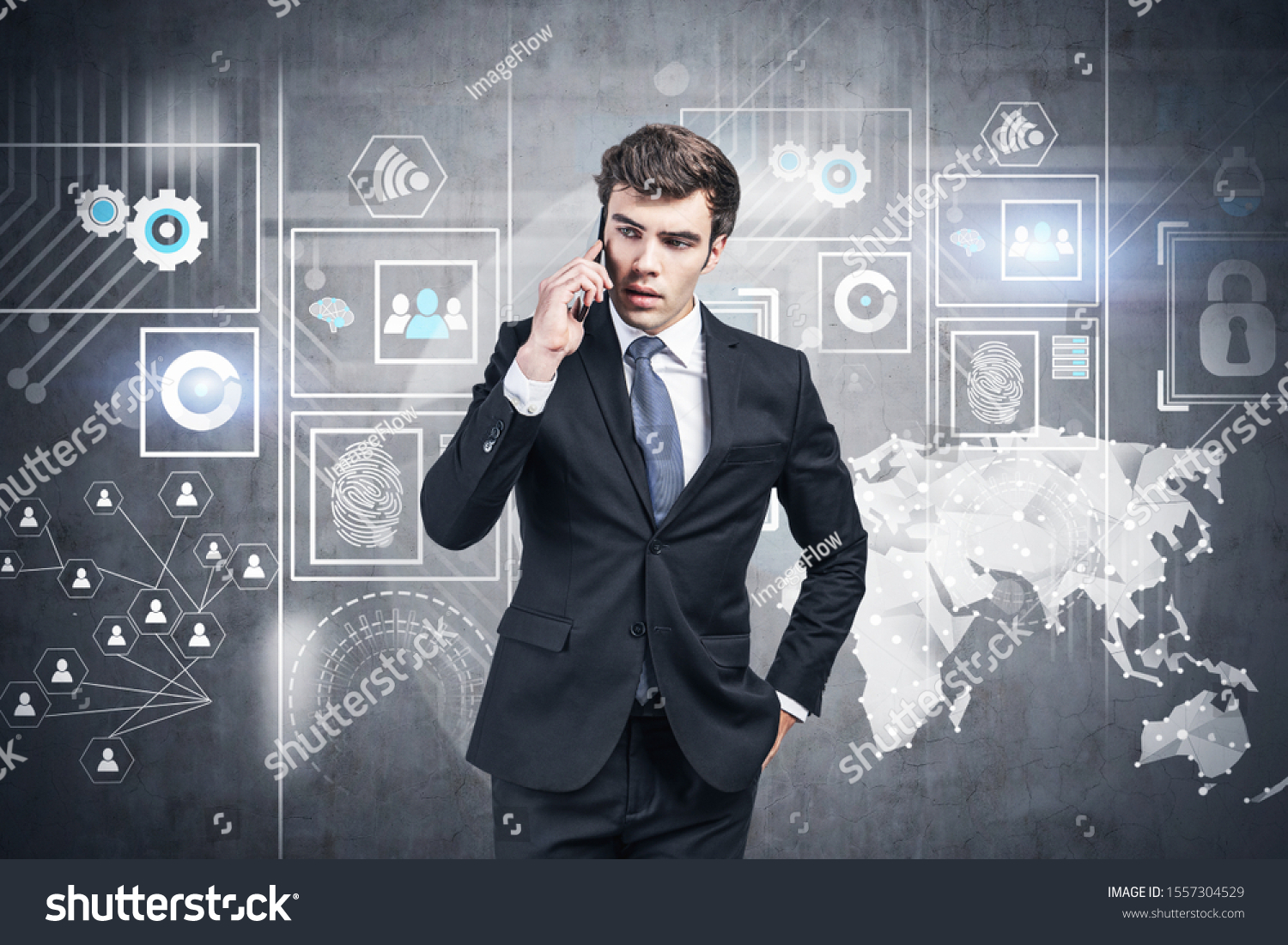 Serious young businessman in black suit talking on smartphone near concrete wall with infographics drawn on it. Concept of big data #1557304529