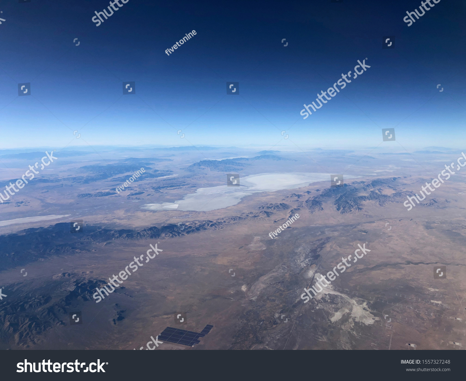Aerial high-altitude view of Sevier Lake near Black Rock, Utah #1557327248
