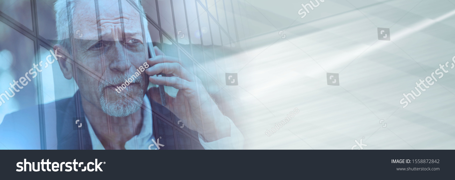 Mature man using his mobile phone, light effect, double exposure; panoramic banner #1558872842